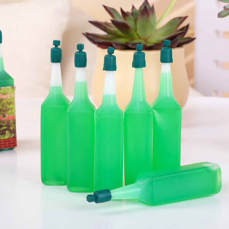 Eco-Friendly Plant Watering Device - Water-Saving Green Bottle