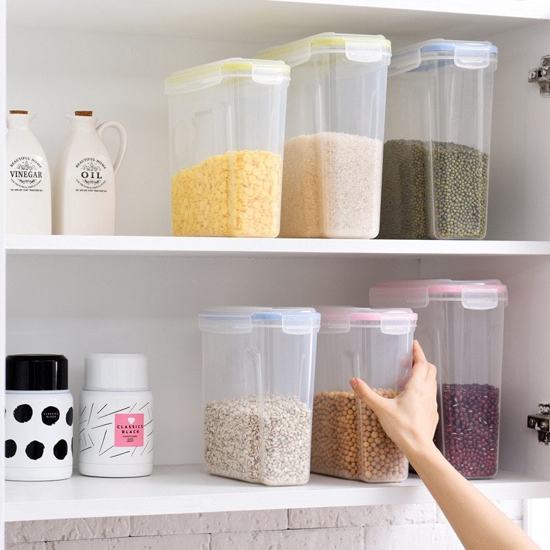Transparent airtight storage containers with colored lids for pantry organization